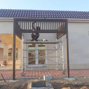A man paint in roof with brush